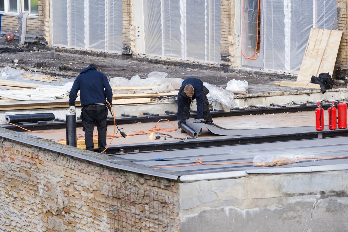 Commercial roofing on a large building